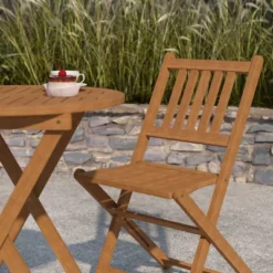 Merrick Lane Three Piece Solid Acacia Wood Folding Patio Bistro Set With Lightweight Round Table And Two Chairs, Natural -Chic Furniture Store GUEST 74d17e17 76f4 4cd1 b765 a40f51982165